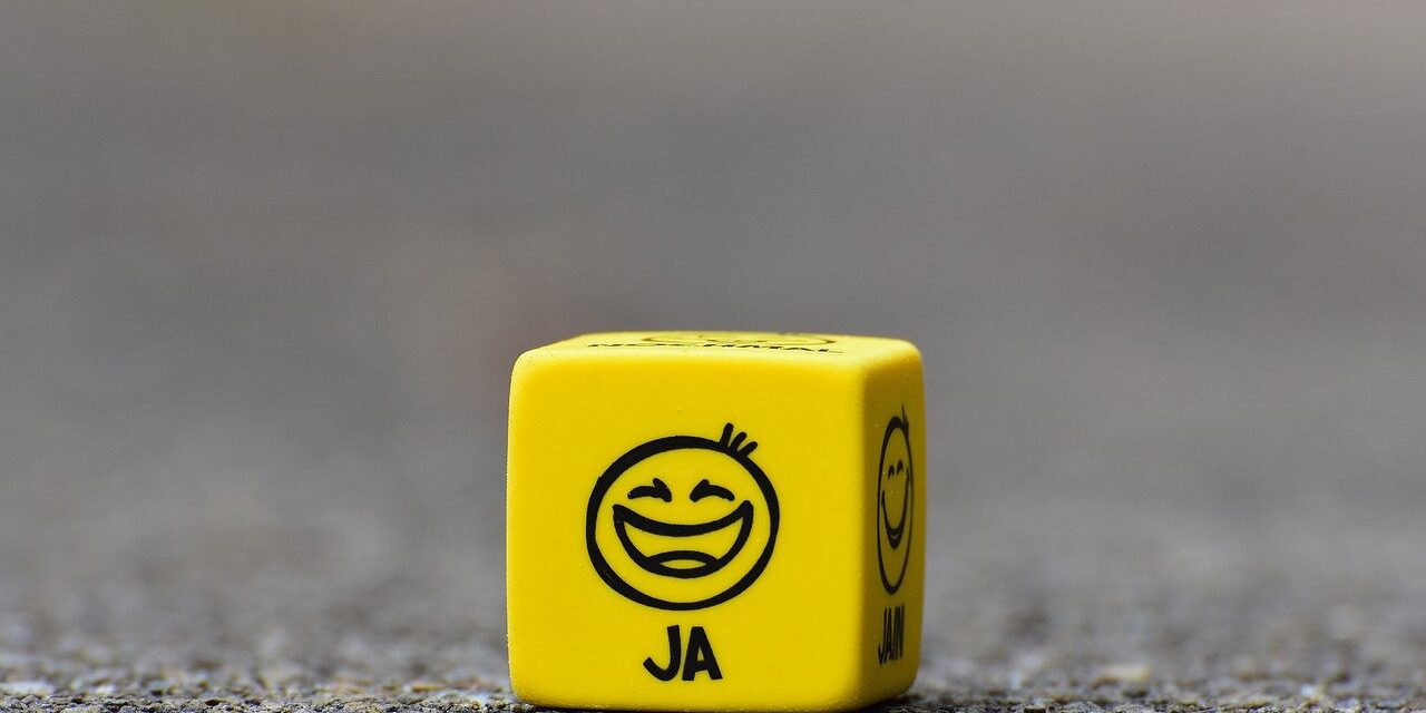 Hoe zit het met de motivatie van jouw werknemers? Dobbelsteen die de gesteldheid van motivatie aangeeft